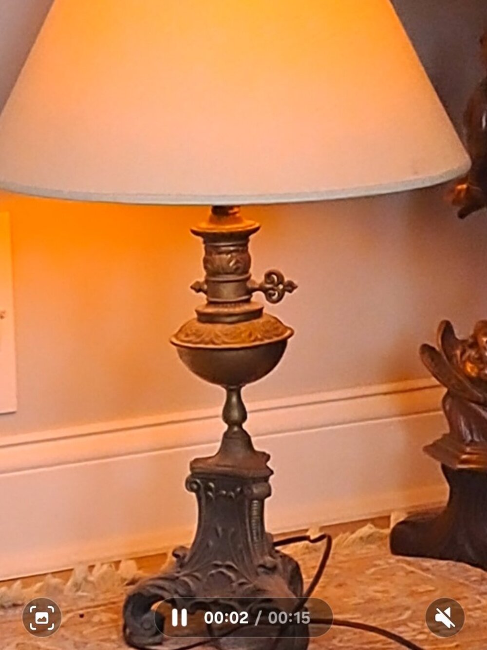 antique Victorian-style brass oil lamp that has been electrified for modern use